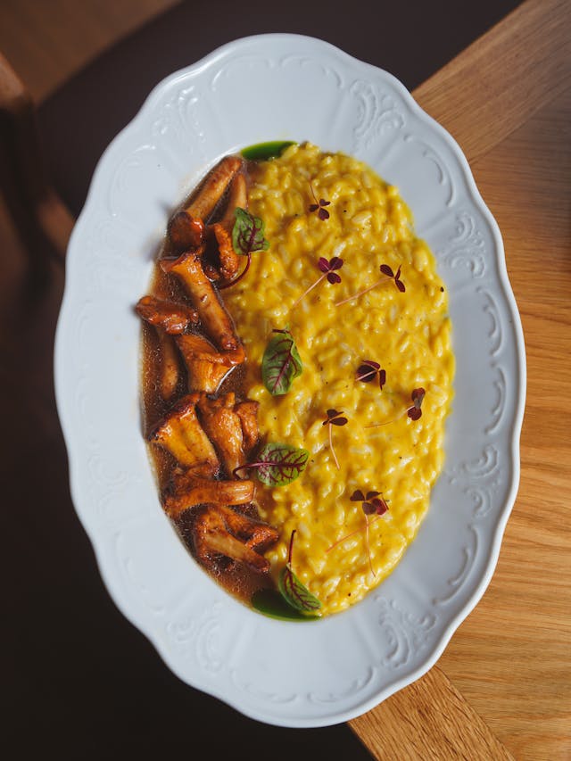 Comparing the Creamy Delight of Risotto with Saffron-Infused Paella