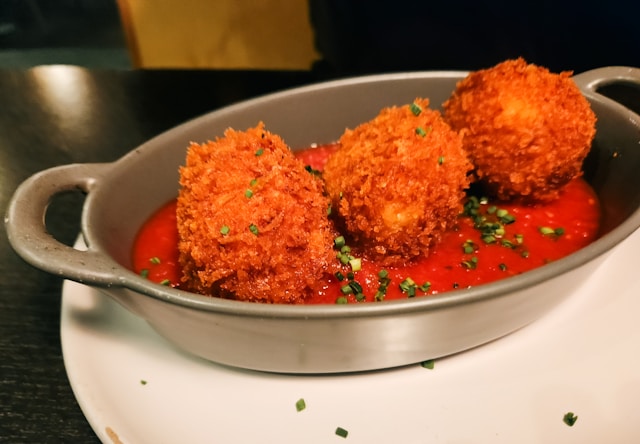 Making Classic Arancini: Flavored Risotto and Frying Secrets